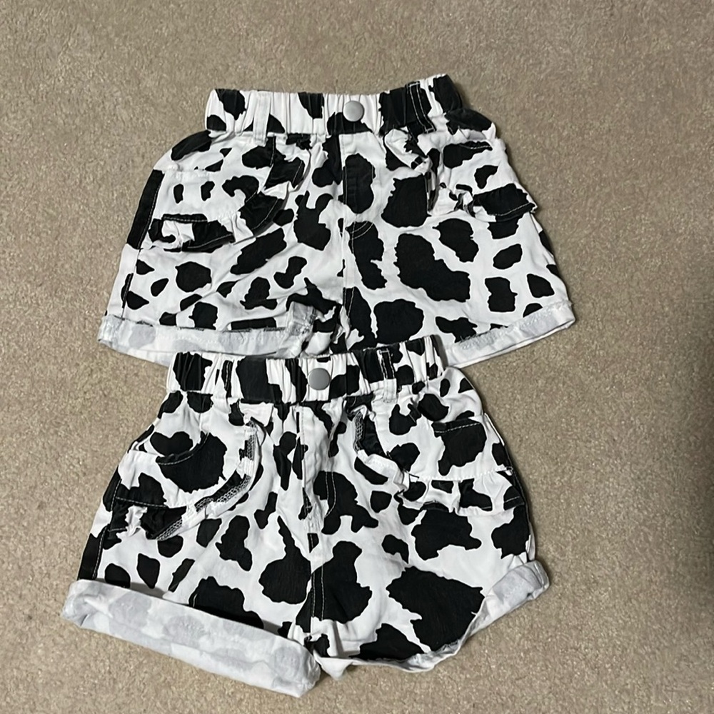 Cow print denim shorts